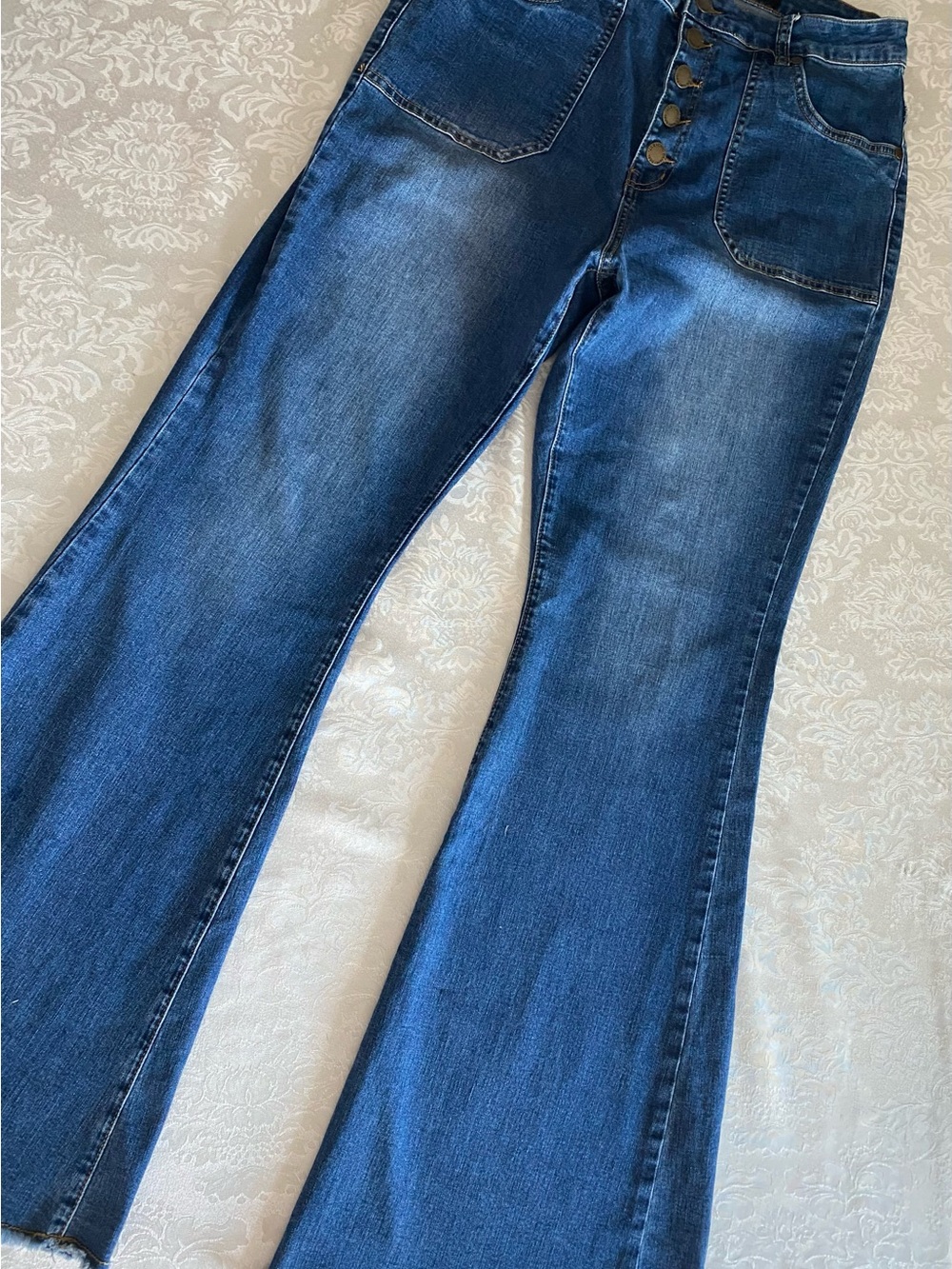 Chic Dark Blue High-Rise Flare Jeans with Button Front